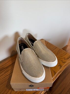 Sperry Perforated Slip-On Sneakers in Metallic Leather Pewter